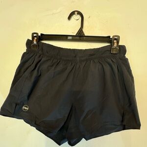 Black Janji storage shorts in size medium